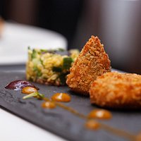 Southern Indian crab cakes 17.90
blue swimmer panko crab cakes, mango chutney; cucumber, puffed lentil chat, beetroot-cumin coulis