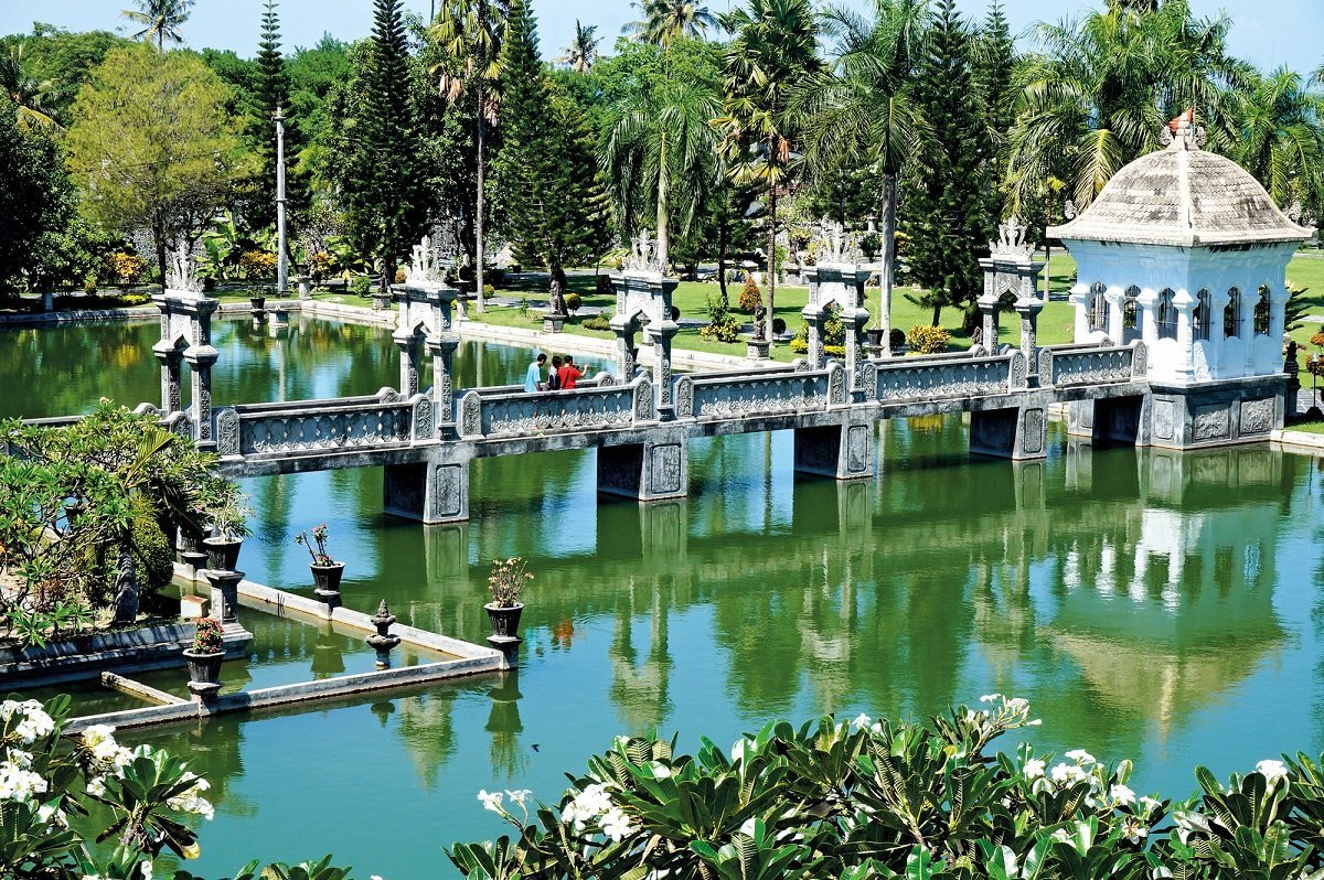Beautifully manicured gardens and intricate architectural details of the historical water palace