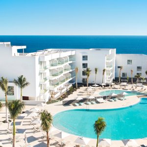 Lava Beach in Lanzarote, image may contain: Hotel, Resort, Pool, Swimming Pool