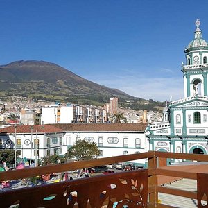View from the breakfast terrace: Volcán Galeras and San Felipe church.