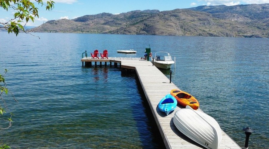 Waterfront boat dock with free access to kayaks and canoes