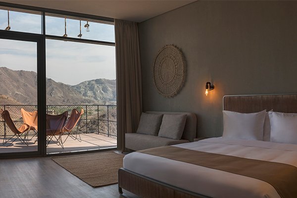 Suite up to 4 guests: King bed + sofa, room size 30 m², Non smoking, AC, Free wifi, TV.