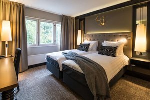 Lapland Hotels Tampere in Tampere, image may contain: Lamp, Furniture, Table Lamp, Bedroom