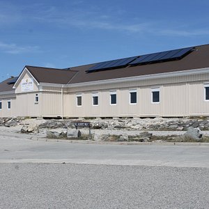 Our exterior has recently been refurbished. Pictured you can see the solar panels for our hot water system, making the most of the Falklands sunshine.