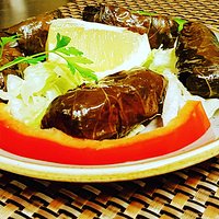 Homade vine leaves wrapped with tasteful ingredients “Dolma”
