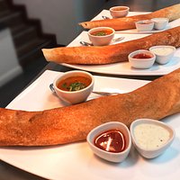 Authentic Dosas - a savoury crêpe either filled with spiced potato and cauliflower; mixed vegetables in a garlic and chilli paste; or paneer (cheese), peas, potato and sweet corn. All served with a daal, coconut chutney and garlic and chilli chutney.