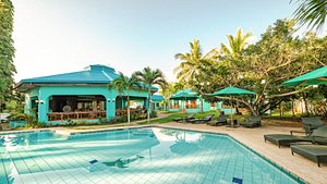 Bohol Sea Resort in Panglao Island, image may contain: Hotel, Resort, Villa, Chair