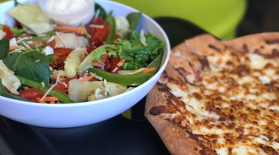 Fresh salad and fresh pizza.  Yum!