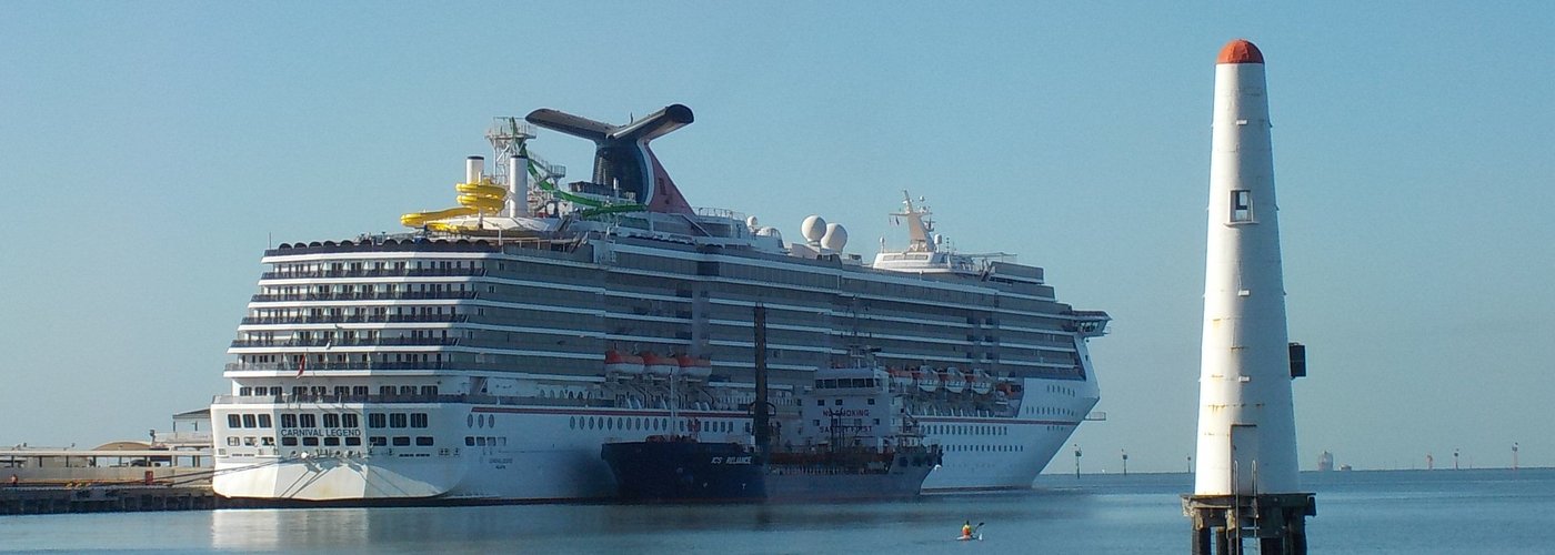 A cruise ship and one of the leading lights
