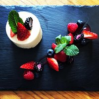 Our gorgeous special of fresh lemon and lime mousse served with a raspberry coulis and fresh berries.