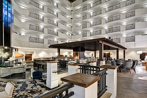 Embassy Suites by Hilton Orlando Downtown in Orlando, image may contain: Restaurant, Hotel, Dining Room, Dining Table