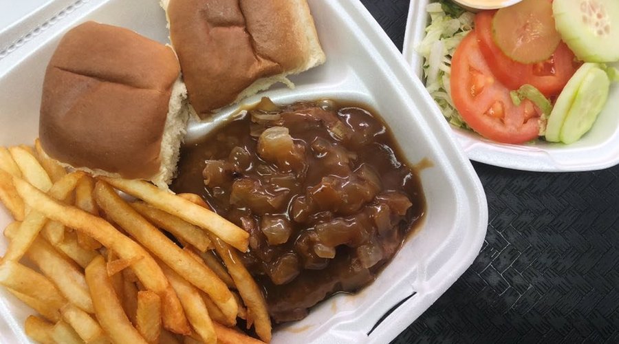 Hamburger Steak plates with side, salad, and bread 