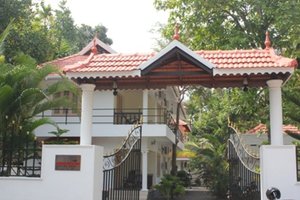 Home Away Homestay in Alappuzha, image may contain: Resort, Hotel, Building, Architecture