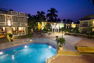 Club Mahindra Acacia Palms in Colva, image may contain: Hotel, Resort, Villa, Pool