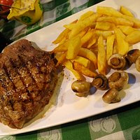 Costilla de 400 gr. con guarnición.