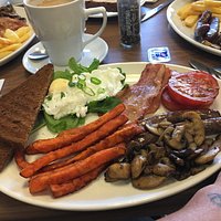 ...a Big Breakfast, poached eggs, bacon, mushrooms, sausage sweet potato fries, tomato & rye toast