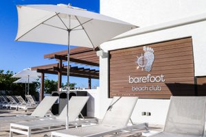 Barefoot Beach Club in Madeira Beach, image may contain: Canopy
