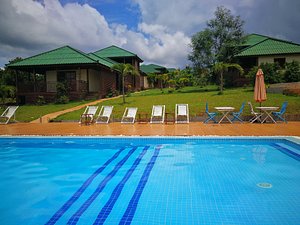 Ratanakiri Paradise Hotel & Restaurant in Banlung, image may contain: Villa, Pool, Hotel, Resort