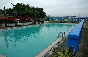 Sato Dizon Beach Resort in Tablas Island, image may contain: Pool, Water, Hotel, Villa