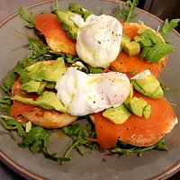 From our Brunch Menu - Smoked salmon, avocado and poached egg on a lightly toasted bagel.