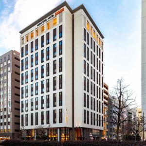 Nishitetsu Hotel Croom Nagoya in Naka, image may contain: Dorm Room, Bed, Furniture, Bedroom