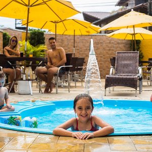 Vila Olaria Hotel in Penha, image may contain: Walking, Person, People, Hotel