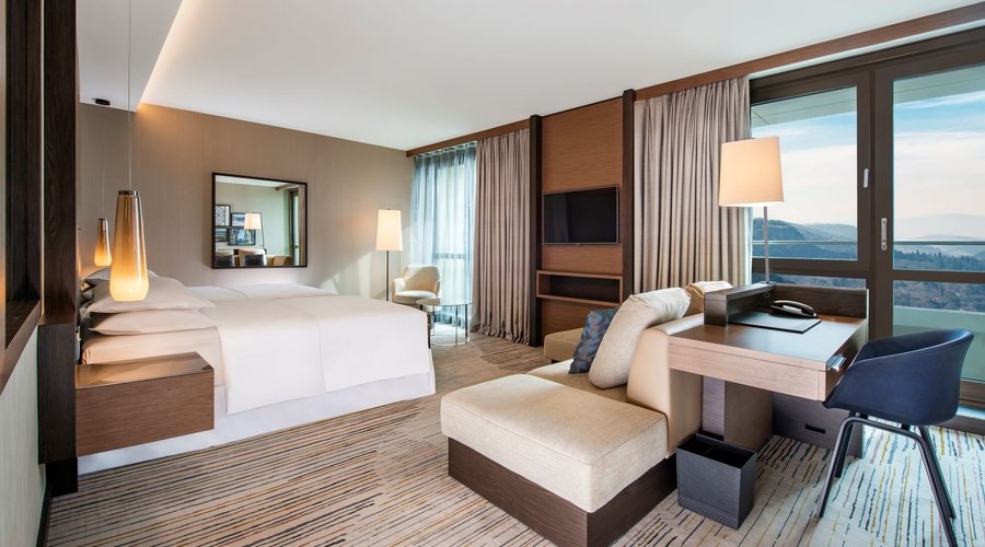 Executive room with balcony and  spectacular views, windows that open, separate bathtub and shower, 42 inch TV and Nespresso machine