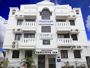 Pondicherry Executive Inn in Pondicherry, image may contain: Hotel, City, Urban, Hospital