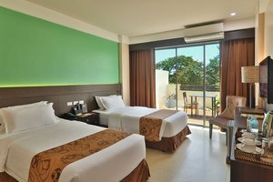 Kew Hotel in Bohol Island, image may contain: Hotel, Building, Resort, Bed