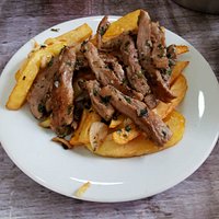 Cerdo ibérico y papas fritas