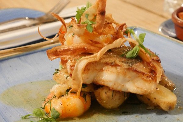 Pan-fried cod with garlic prawns