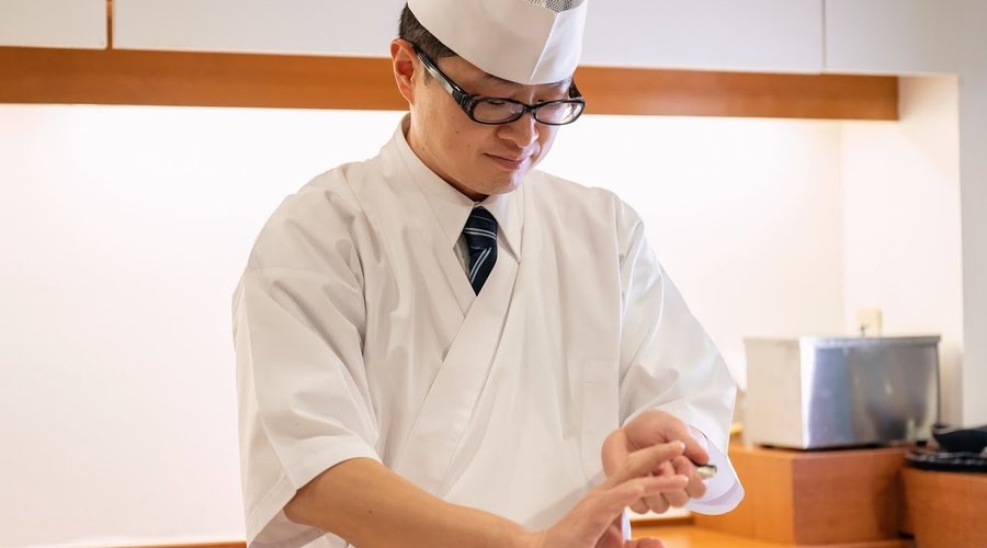 Sushi chef Sato.