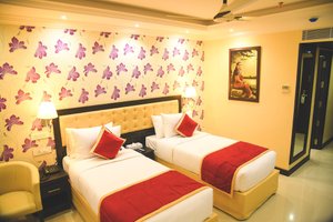 Sajjoys in Varkala Town, image may contain: Chair, Furniture, Hotel, Dorm Room