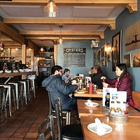 Oyster menu, full bar or table seating