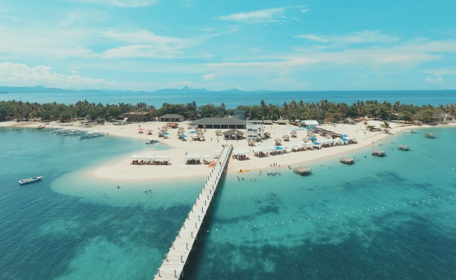 Lakawon, also called Llacaon, is a 16-hectare, banana-shaped island off the coast of Cadiz in the northern portion of Negros Occidental, a province in the Negros Island Region of the Philippines. It is the home of TawHai, the biggest floating bar in Asia.