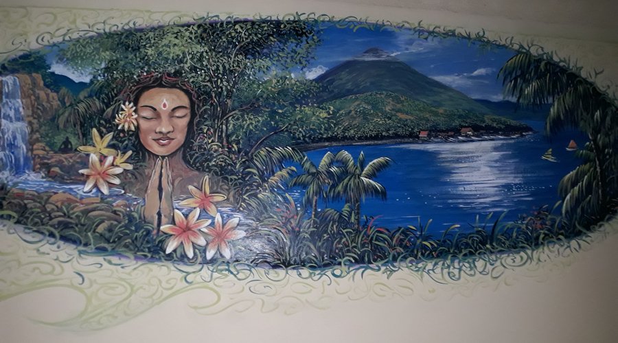 Mural on the wall at entrance to Om Shanti.