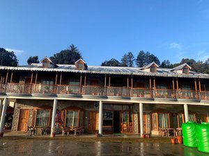 Kausani Best Inn in Kausani, image may contain: Hotel, Resort, Building, Chair