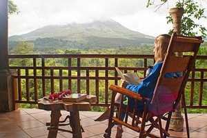 Lost Iguana Resort & Spa in Arenal Volcano National Park, image may contain: Balcony, Building, Person, Resort