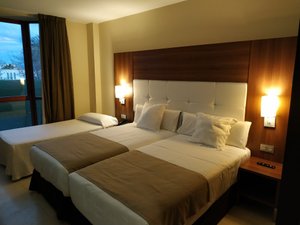 Hotel Spa Jardines de Lorca in Lorca, image may contain: Remote Control, Bed, Furniture, Bedroom