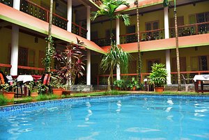 Ideal Ayurvedic Resort in Chowara, image may contain: Resort, Hotel, Villa, Plant