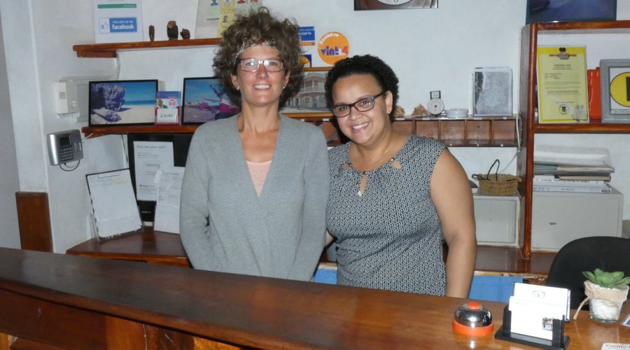 Judith and Simone behind reception desk