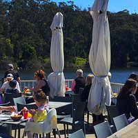 Our expansive outdoor deck area, over Lake Daylesford. The perfect place for lunch or dinner with family and friends on a sunny day.