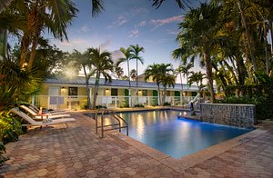 Almond Tree Inn in Key West, image may contain: Villa, Hotel, Resort, Pool