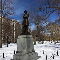 Sumner Statue From the left side holding papers.