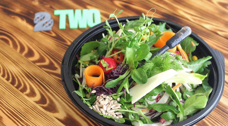 “Veggies dance” salad with dressing in the dropper