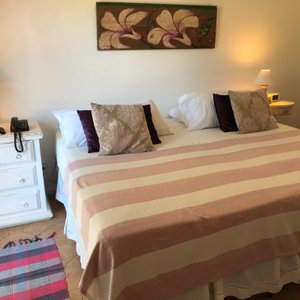 Solar Das Artes Pousada Boutique - Morro in Ilha de Tinhare, image may contain: Home Decor, Bed, Furniture, Cushion
