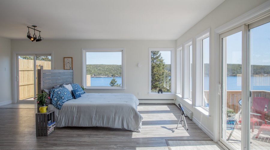 The King Bed suite comes with a kitchen cart complete with mini-fridge, microwave, coffee maker, and kettle