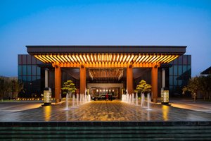 Yanqi Hotel Beijing Managed by Kempinski in Beijing, image may contain: Convention Center, Lighting, Office Building, Hotel