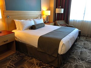 River Rock Casino Resort in Richmond, image may contain: Furniture, Bed, Lamp, Bedroom