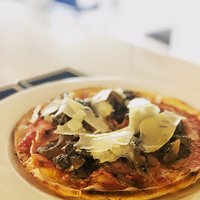 Our famous and best selling Bologna, mushrooms sautéed with truffle and cooked perfectly with gourmet ham
